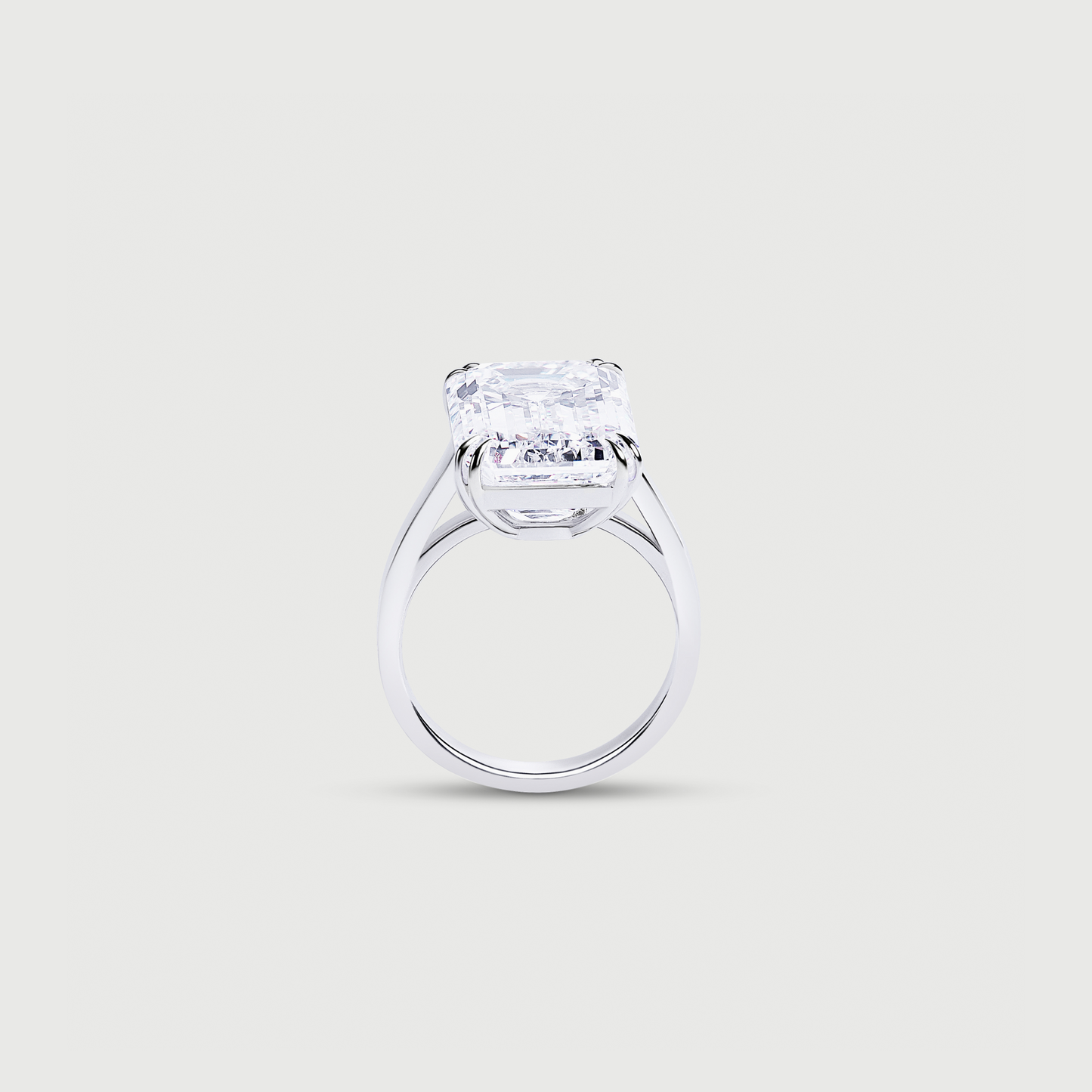 Diamond ring on a light gray background