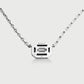 Silver necklace with a rectangular gemstone pendant on a white background