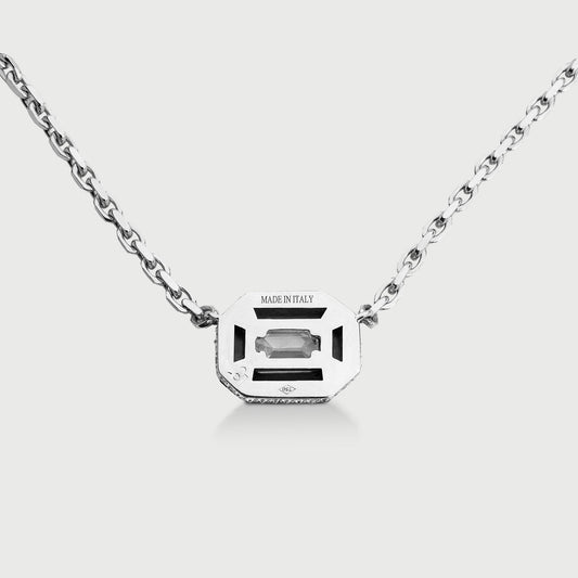 Silver necklace with a rectangular gemstone pendant on a white background